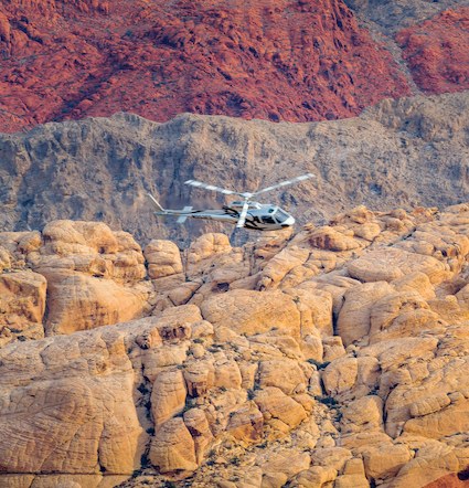 Deep red rock formations seen from above
